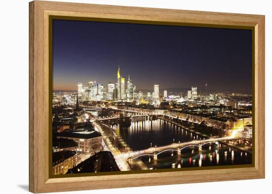 View over Main River to Ignatz Bubis Bridge financial district skyline, Frankfurt, Hesse, Germany, -Markus Lange-Framed Premier Image Canvas