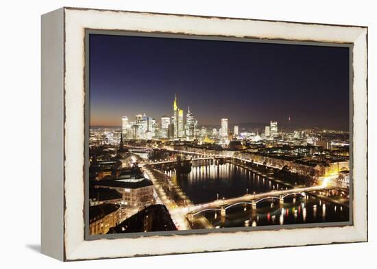 View over Main River to Ignatz Bubis Bridge financial district skyline, Frankfurt, Hesse, Germany, -Markus Lange-Framed Premier Image Canvas