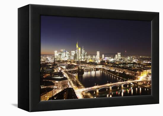 View over Main River to Ignatz Bubis Bridge financial district skyline, Frankfurt, Hesse, Germany, -Markus Lange-Framed Premier Image Canvas