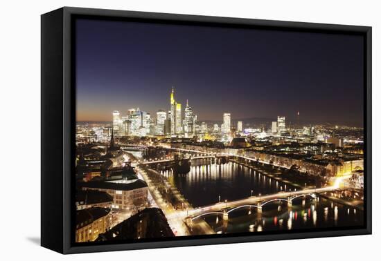 View over Main River to Ignatz Bubis Bridge financial district skyline, Frankfurt, Hesse, Germany, -Markus Lange-Framed Premier Image Canvas