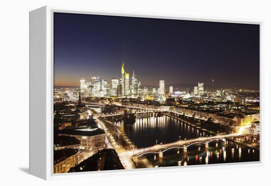 View over Main River to Ignatz Bubis Bridge financial district skyline, Frankfurt, Hesse, Germany, -Markus Lange-Framed Premier Image Canvas