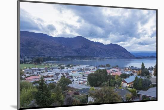 View over rooftops to Lake Wanaka at dusk, Wanaka, Queenstown-Lakes district, Otago, South Island, -Ruth Tomlinson-Mounted Photographic Print