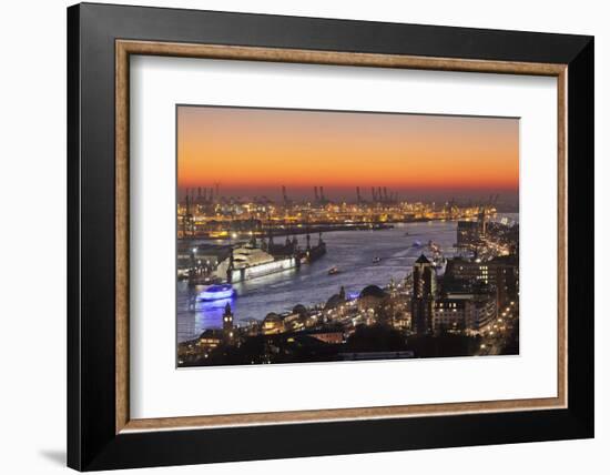 View over St. Pauli district and St. Pauli Landungsbruecken pier over the harbour at sunset, Hambur-Markus Lange-Framed Photographic Print