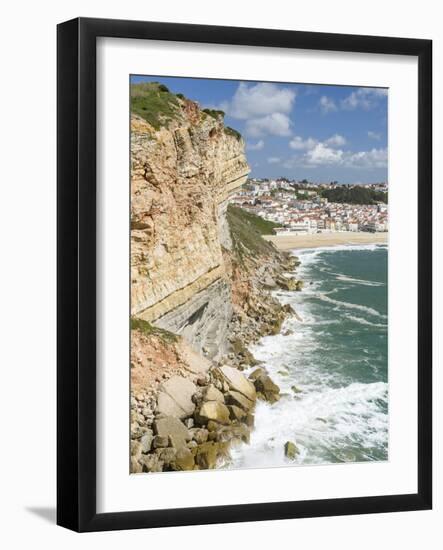 View over town and beach from Sitio. The town Nazare on the coast of the Atlantic Ocean. Portugal.-Martin Zwick-Framed Photographic Print