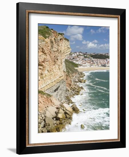 View over town and beach from Sitio. The town Nazare on the coast of the Atlantic Ocean. Portugal.-Martin Zwick-Framed Photographic Print