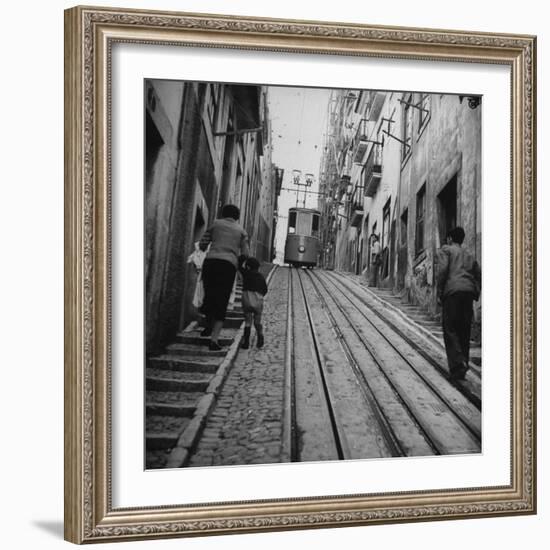 View Showing a Typical Street Scene in Lisbon-Bernard Hoffman-Framed Photographic Print