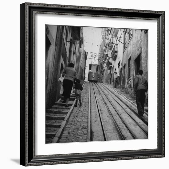 View Showing a Typical Street Scene in Lisbon-Bernard Hoffman-Framed Photographic Print