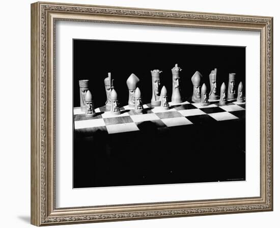 View Showing Chess Pieces with Faces Carved Into Them-David Scherman-Framed Photographic Print