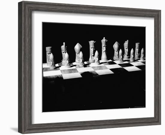 View Showing Chess Pieces with Faces Carved Into Them-David Scherman-Framed Photographic Print