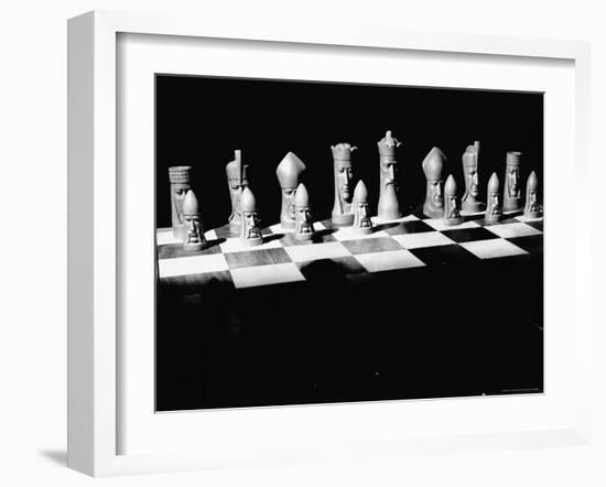 View Showing Chess Pieces with Faces Carved Into Them-David Scherman-Framed Photographic Print