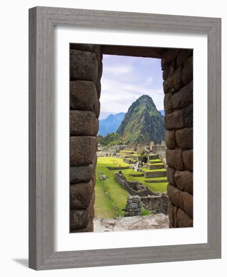 View Through Window of Ancient Lost City of Inca, Machu Picchu, Peru, South America with Llamas-Miva Stock-Framed Photographic Print