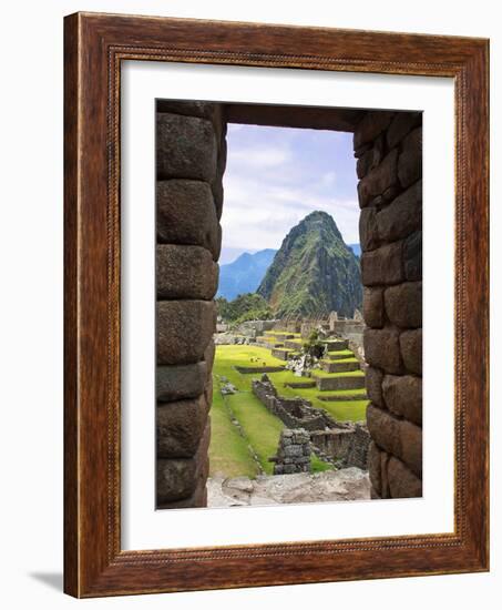 View Through Window of Ancient Lost City of Inca, Machu Picchu, Peru, South America with Llamas-Miva Stock-Framed Photographic Print