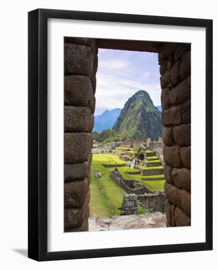 View Through Window of Ancient Lost City of Inca, Machu Picchu, Peru, South America with Llamas-Miva Stock-Framed Photographic Print