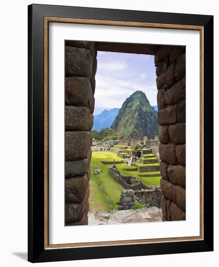 View Through Window of Ancient Lost City of Inca, Machu Picchu, Peru, South America with Llamas-Miva Stock-Framed Photographic Print