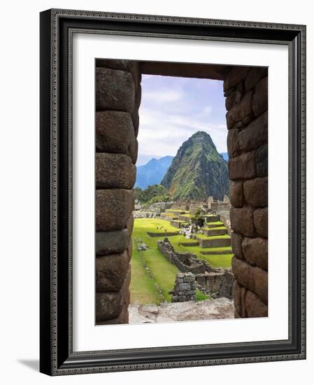 View Through Window of Ancient Lost City of Inca, Machu Picchu, Peru, South America with Llamas-Miva Stock-Framed Photographic Print