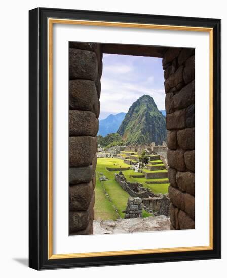 View Through Window of Ancient Lost City of Inca, Machu Picchu, Peru, South America with Llamas-Miva Stock-Framed Photographic Print