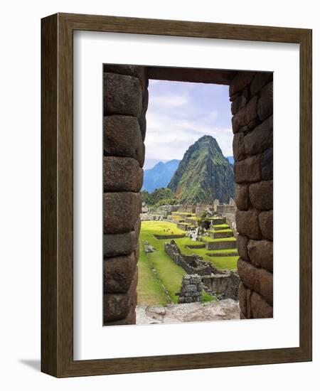 View Through Window of Ancient Lost City of Inca, Machu Picchu, Peru, South America with Llamas-Miva Stock-Framed Photographic Print