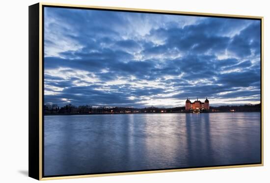 View to the illuminated castle Moritzburg, Saxony, in the early evening hours, blue hour with unusu-UtArt-Framed Premier Image Canvas