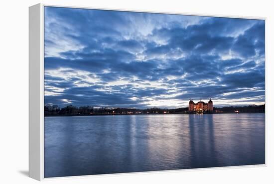 View to the illuminated castle Moritzburg, Saxony, in the early evening hours, blue hour with unusu-UtArt-Framed Premier Image Canvas