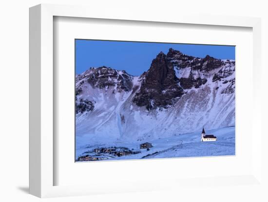 Vik i Myrdal Church, floodlit at twilight after snowfall, Vik, Iceland. December 2017.-Ross Hoddinott-Framed Photographic Print