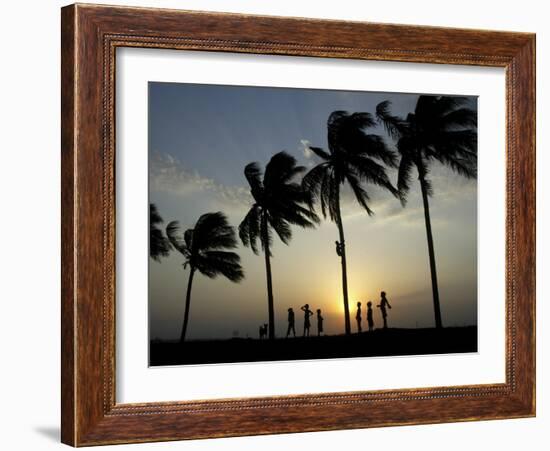 Village Boy Climbs a Coconut Tree as Others Wait Below on the Outskirts of Bhubaneshwar, India-null-Framed Photographic Print