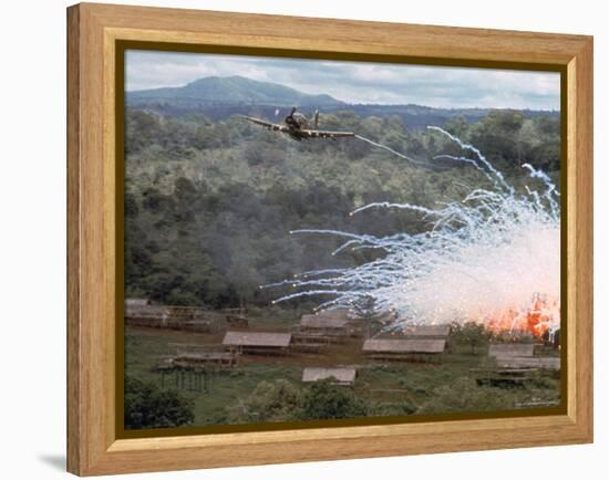 Village in flames after Explosives Dropped During an American Air Strike Against Viet Cong-Larry Burrows-Framed Premier Image Canvas