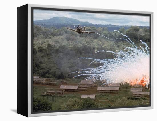 Village in flames after Explosives Dropped During an American Air Strike Against Viet Cong-Larry Burrows-Framed Premier Image Canvas