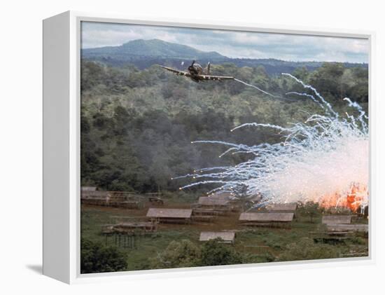 Village in flames after Explosives Dropped During an American Air Strike Against Viet Cong-Larry Burrows-Framed Premier Image Canvas
