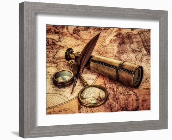 Vintage Magnifying Glass, Compass, Goose Quill Pen And Spyglass Lying On An Old Map-Andrey Armyagov-Framed Art Print