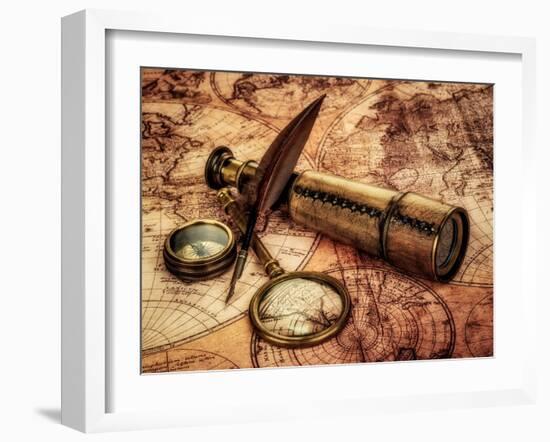 Vintage Magnifying Glass, Compass, Goose Quill Pen And Spyglass Lying On An Old Map-Andrey Armyagov-Framed Art Print