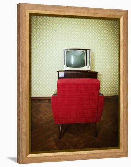 Vintage Room with Two Old Fashioned Armchair and Retro Tv over Obsolete Wallpaper. Toned-khorzhevska-Framed Premier Image Canvas