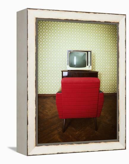 Vintage Room with Two Old Fashioned Armchair and Retro Tv over Obsolete Wallpaper. Toned-khorzhevska-Framed Premier Image Canvas