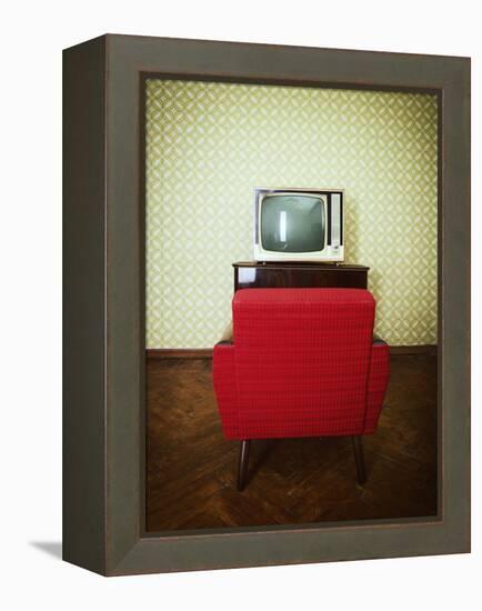 Vintage Room with Two Old Fashioned Armchair and Retro Tv over Obsolete Wallpaper. Toned-khorzhevska-Framed Premier Image Canvas