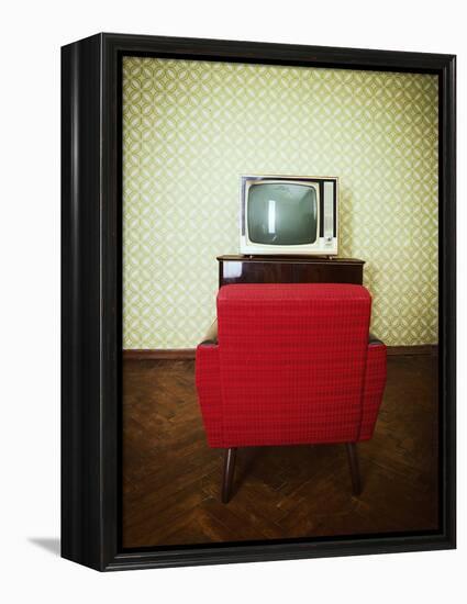 Vintage Room with Two Old Fashioned Armchair and Retro Tv over Obsolete Wallpaper. Toned-khorzhevska-Framed Premier Image Canvas