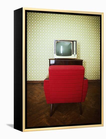 Vintage Room with Two Old Fashioned Armchair and Retro Tv over Obsolete Wallpaper. Toned-khorzhevska-Framed Premier Image Canvas