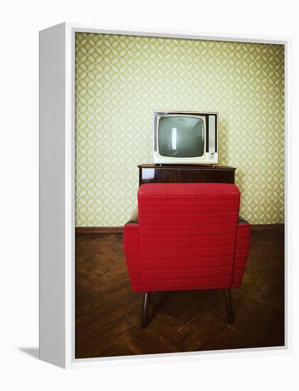 Vintage Room with Two Old Fashioned Armchair and Retro Tv over Obsolete Wallpaper. Toned-khorzhevska-Framed Premier Image Canvas