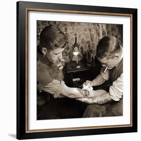 Vintage Shot of a Man Being Tattooed-null-Framed Photographic Print