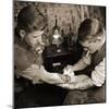 Vintage Shot of a Man Being Tattooed-null-Mounted Photographic Print