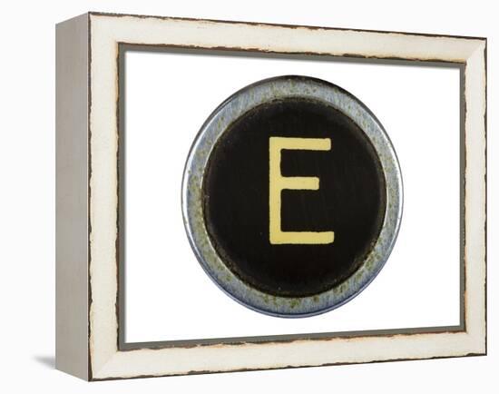 Vintage Typewriter Letter E Isolated On White-Steve Collender-Framed Stretched Canvas