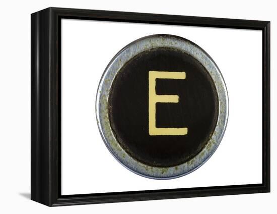 Vintage Typewriter Letter E Isolated On White-Steve Collender-Framed Stretched Canvas