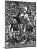 Violent Action: Don Helleder Trying to Retrieve Ball from Navy Defense During Army-Navy Game-John Dominis-Mounted Photographic Print