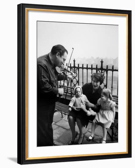 Violinist Isaac Stern and Entertaining Woman and Children-Alfred Eisenstaedt-Framed Premium Photographic Print