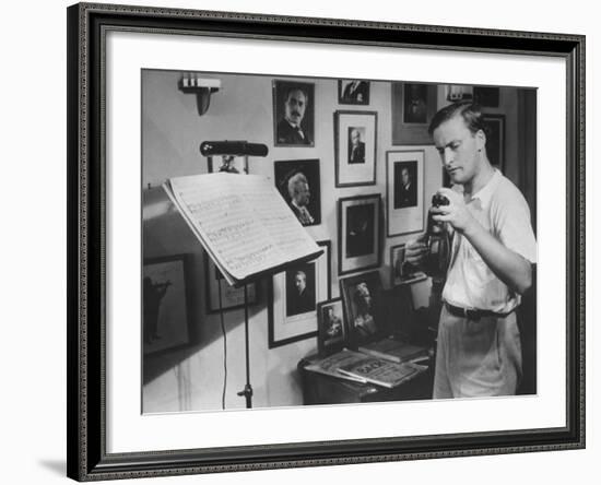 Violinist Yehudi Menuhin, 20, Tuning His Violin, Prepares to Practice the Schumann Violin Concerto-Horace Bristol-Framed Premium Photographic Print