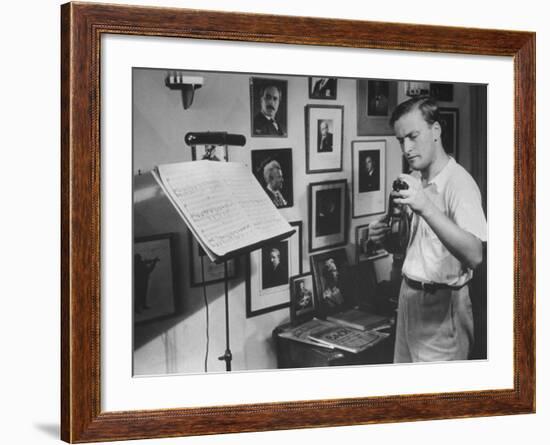 Violinist Yehudi Menuhin, 20, Tuning His Violin, Prepares to Practice the Schumann Violin Concerto-Horace Bristol-Framed Premium Photographic Print