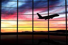 Airport Window with Airplane Flying at Sunset-viperagp-Photographic Print