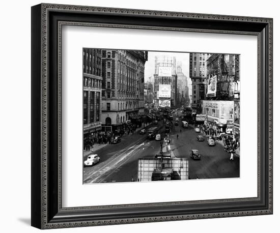Visitors and Residents of New York City Spend Their Time Window-Shopping Around the Times Square-null-Framed Photographic Print