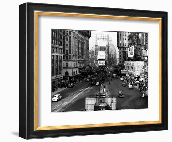 Visitors and Residents of New York City Spend Their Time Window-Shopping Around the Times Square-null-Framed Photographic Print