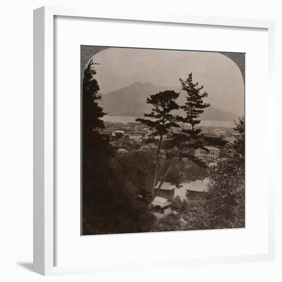 'Vista from hills above Kagoshima over Lake to distant Sakurajima volcano, Japan', 1904-Unknown-Framed Photographic Print