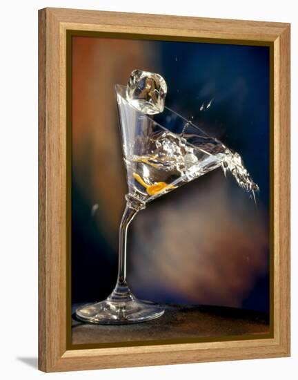 Vodka Martini Spilling from a Bent Martini Glass with Ice Cube-Jeff Sarpa-Framed Premier Image Canvas
