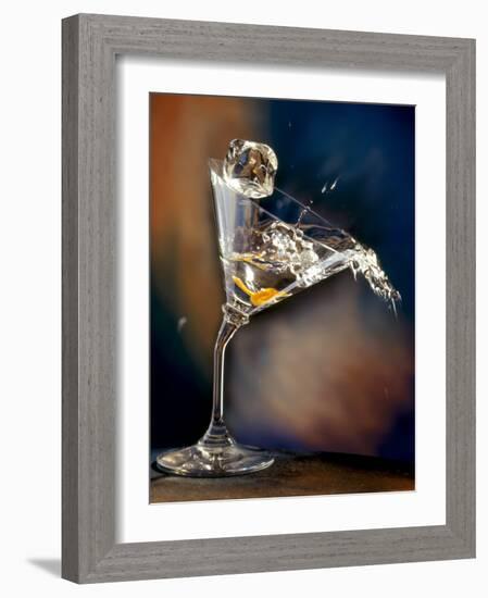 Vodka Martini Spilling from a Bent Martini Glass with Ice Cube-Jeff Sarpa-Framed Photographic Print